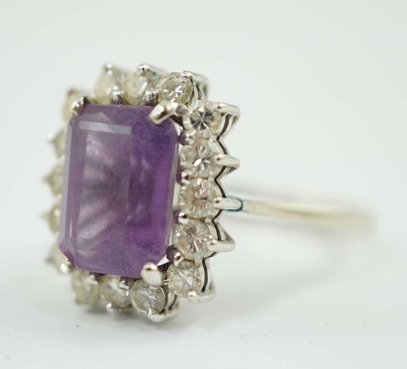 A modern white gold, amethyst and diamond set rectangular cluster ring